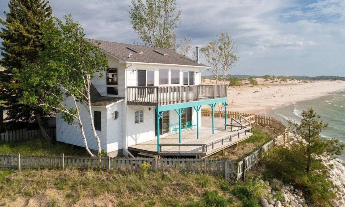 Mears House | This charming vacation home sits directly on Lake Michigan and it delivers!