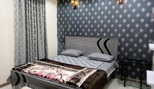 2BR Fully Furnished Modern House at Prime Location in Lahore