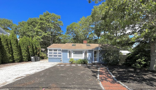 Escape to a seaside cottage in Popponesset. Beach less than 5 minutes away in Mashpee
