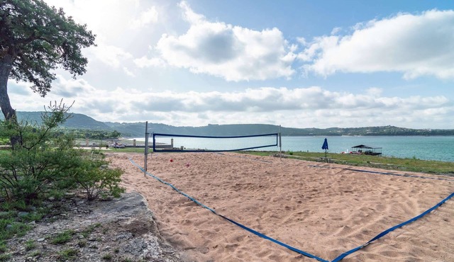 Lakefront Home with Lake Views, Boat Dock, Sand Volleyball and Optional Bar and Game Room in Austin