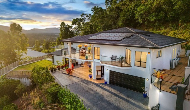 Your Ultimate Escape in Mooroobool- Luxury Tropical Retreat with Pool & Stunning Views – Perfect for Families & Groups! in Mooroobool