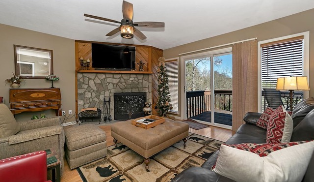 Stay directly above Toxaway Falls with breathtaking mountain views. in Lake Toxaway
