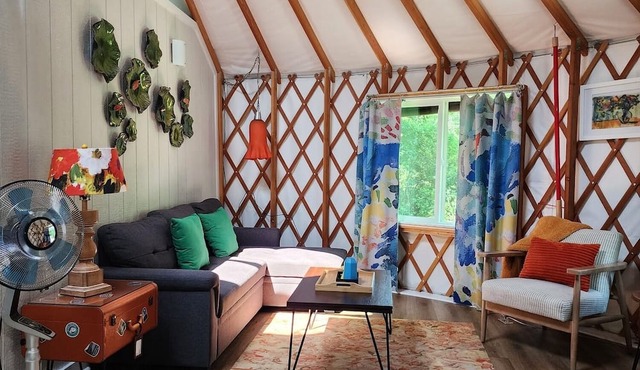 30' ADA Yurt with a large deck, on the creek, full kitchen, dome skylight, dog friendly, 2 bedrooms, sleeps 5. in Mill Spring
