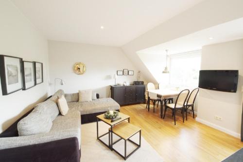 Apartment "Watt n Nest" mit sonnigem Südbalkon Sauna und Parkplatz - 200m zum Deich in Dorum-Neufeld